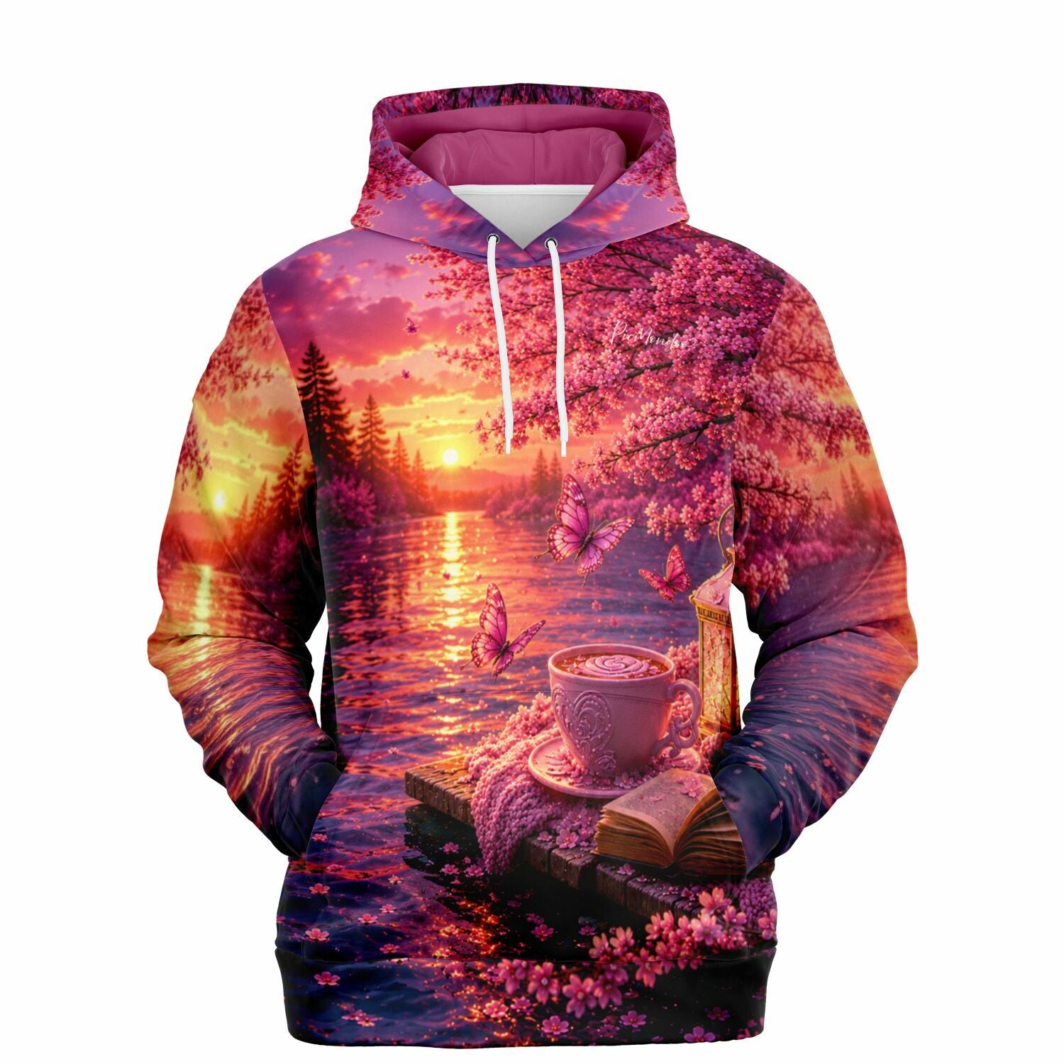 Dreamer Hoodie mit stimmungsvollem Motiv: Tasse, Buch und Schmetterlinge am See, inspiriert durch Diamond Painting Kunst.